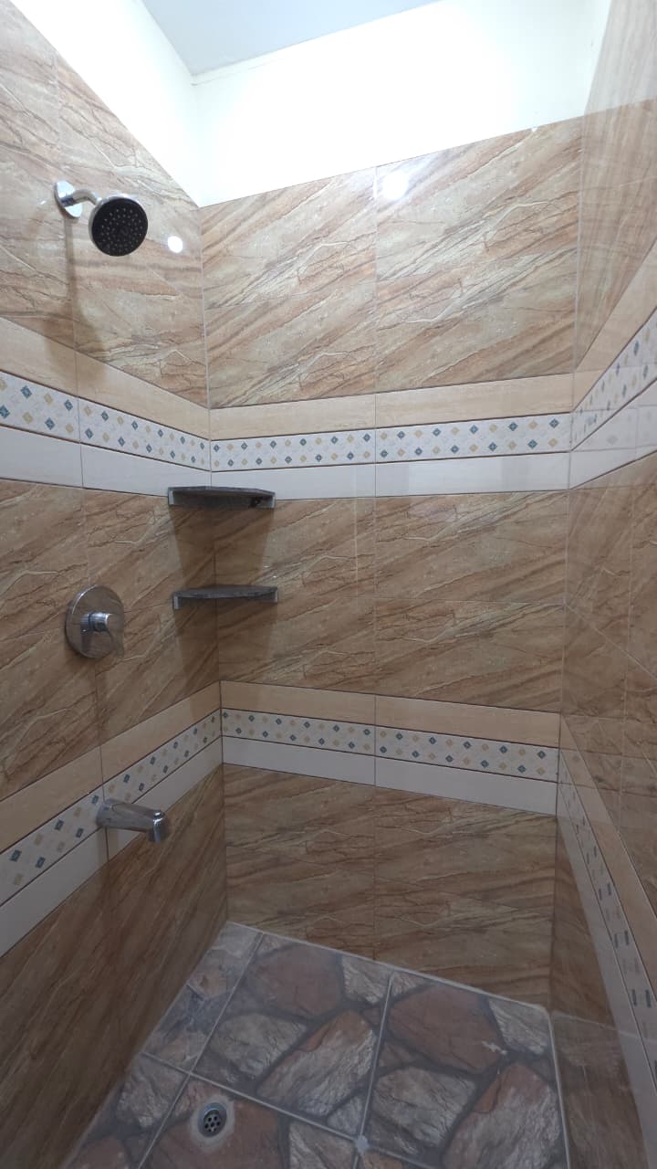 10 Spacious 4-Bedroom House for Rent – Sinanan Gardens, Santa Cruz